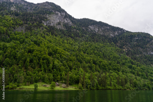 lake in mountains with some clouds