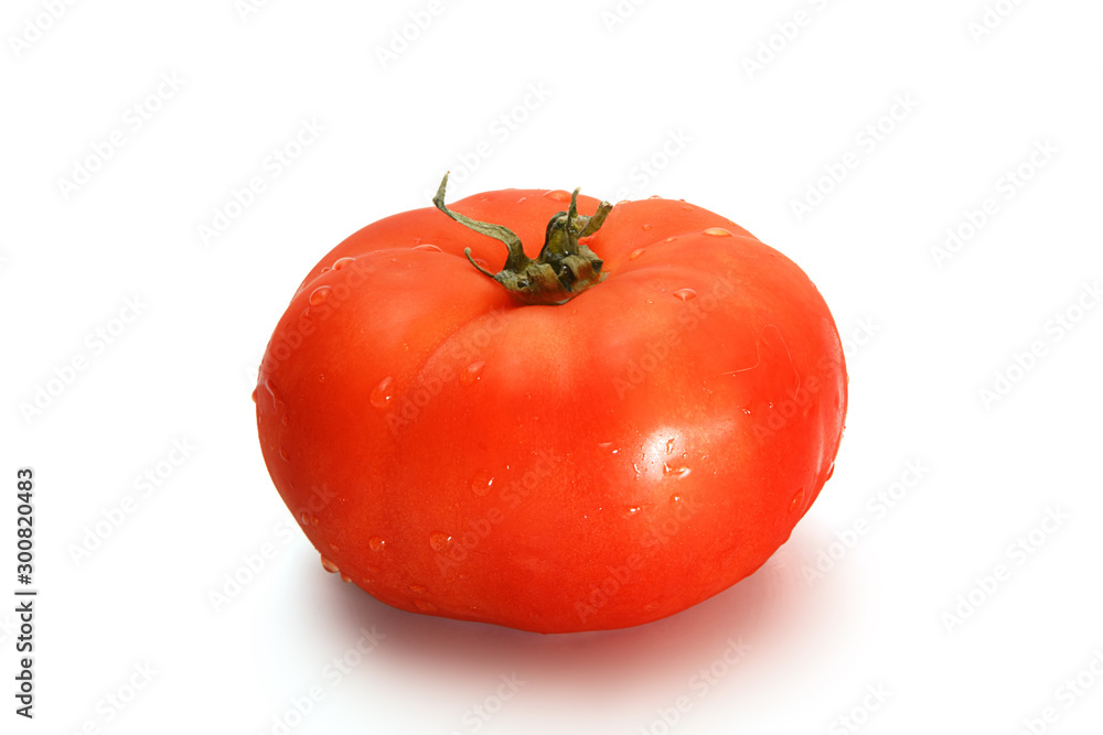 Delicious red tomato on a white background. Delicious red tomato on a white background.