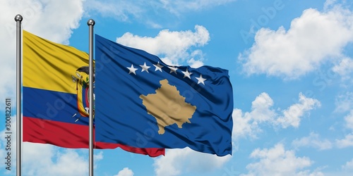 Ecuador and Kosovo flag waving in the wind against white cloudy blue sky together. Diplomacy concept, international relations.