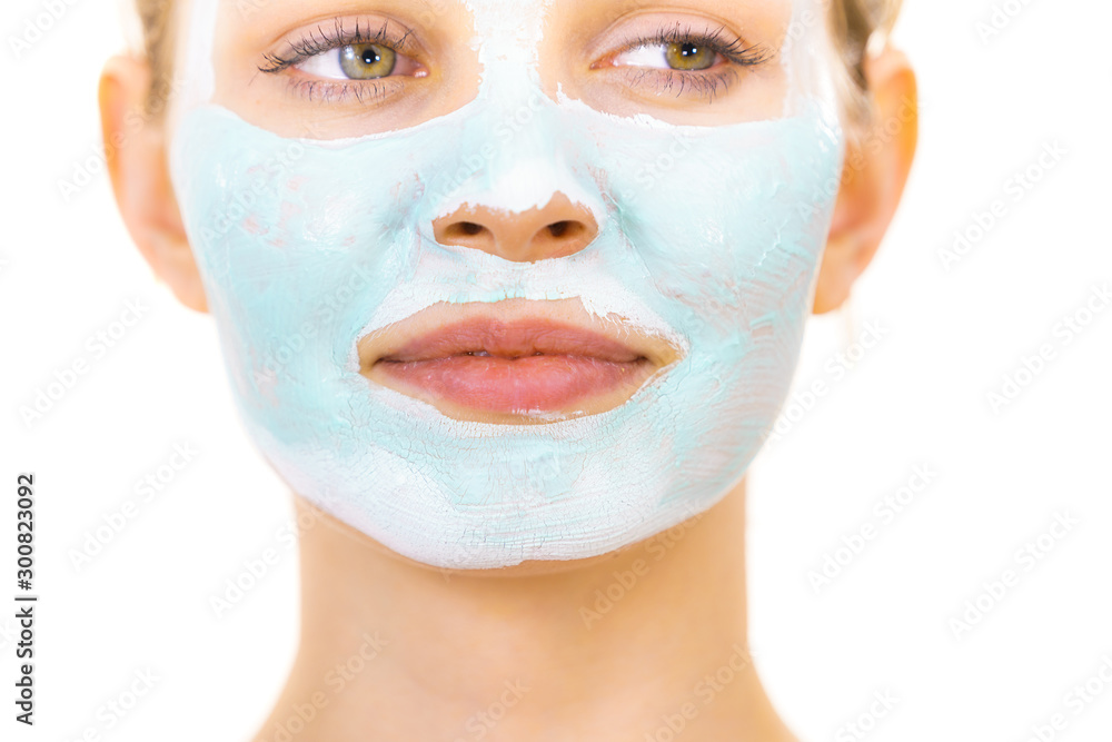 Girl with green mud mask on face Girl with green mud mask on face