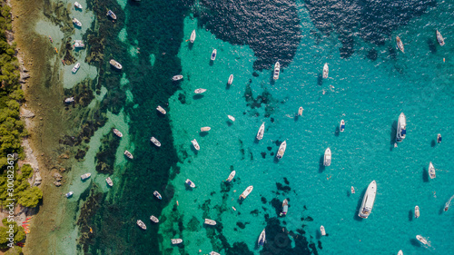 Fotografie, Obraz Overhead aerial drone view of yachts in mediterranean sea in summer sunny day ne