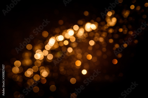 Gold abstract bokeh on black