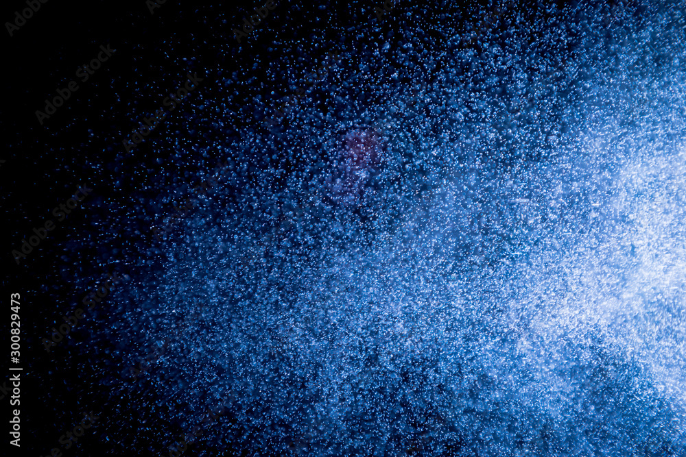Obraz premium Blue bokeh on black