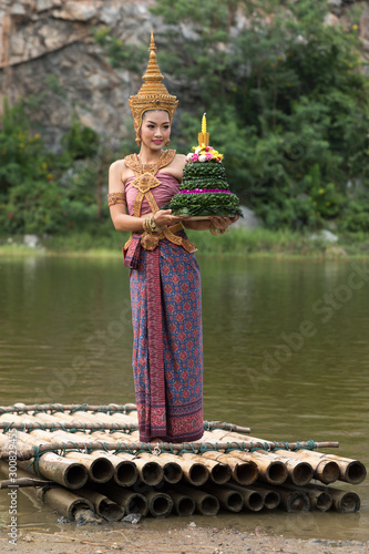 beautiful thai model wearing thai traditiomal loy kratong festival