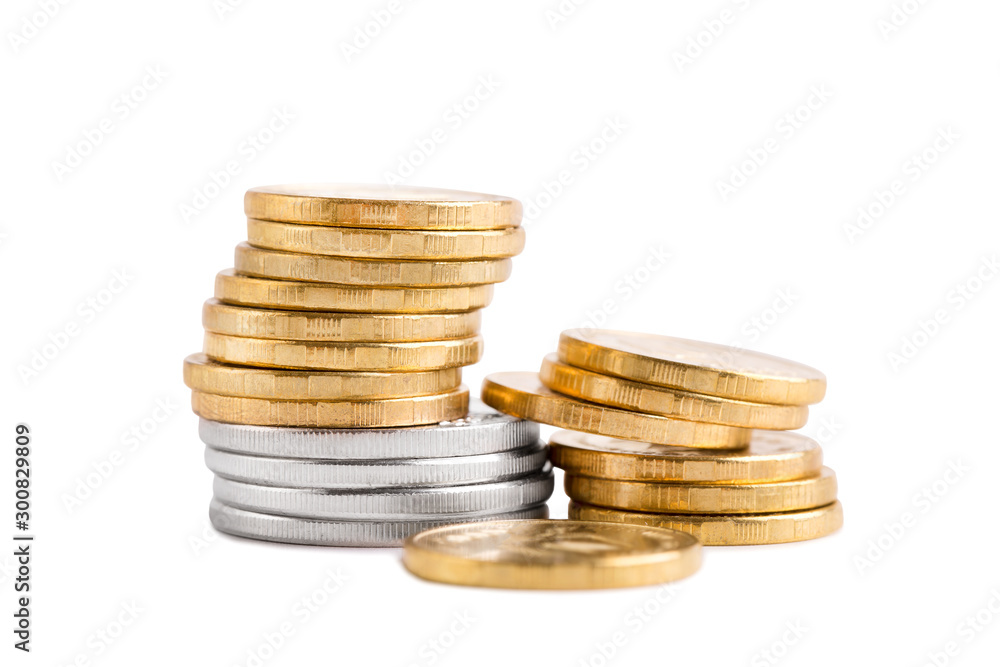 Stack of gold and silver coins close-up. Stack of gold and silver coins close-up. Stack of gold and silver coins close-up. Stack of gold and silver coins close-up.