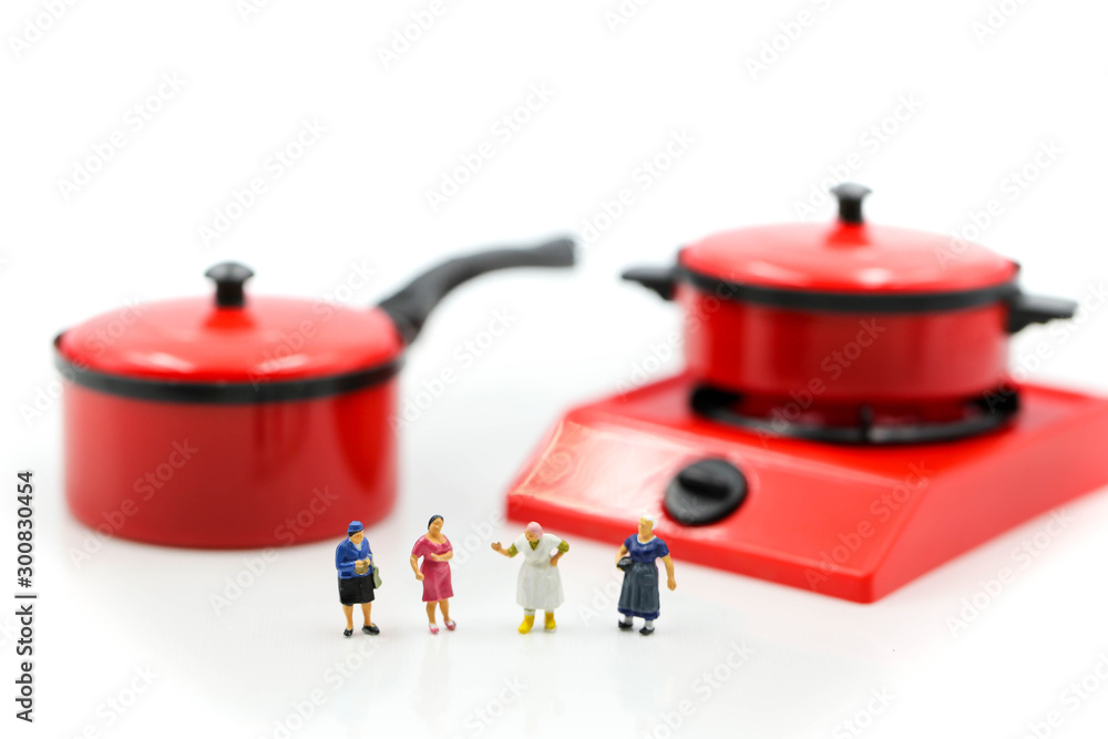 Miniature people : Maid or Housewife cleaning and Cook chef in kitchen interior with kitchenware Miniature people : Maid or Housewife cleaning and Cook chef in kitchen interior with kitchenware