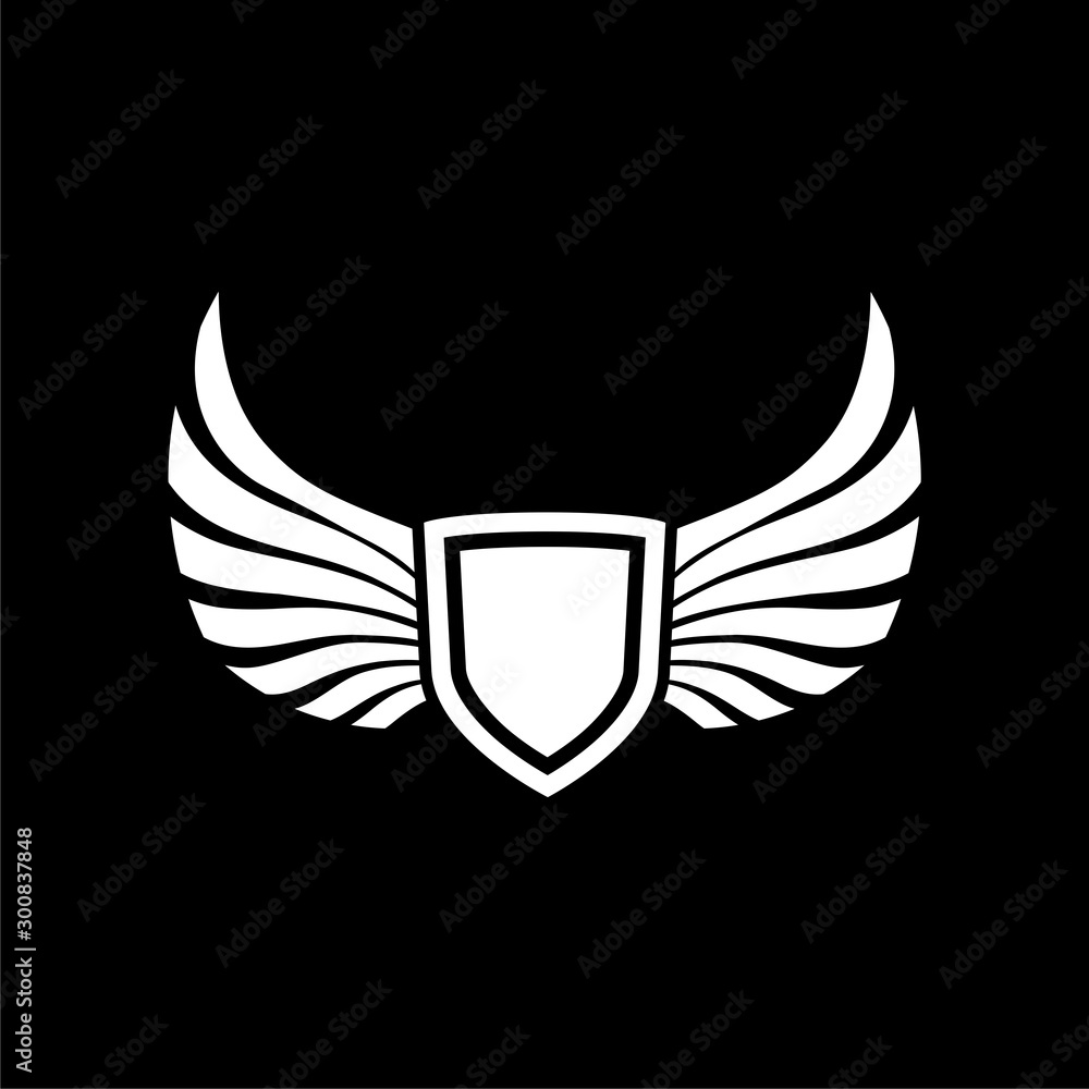 Abstract creative shield and wings logo design isolated on black background Abstract creative shield and wings logo design isolated on black background