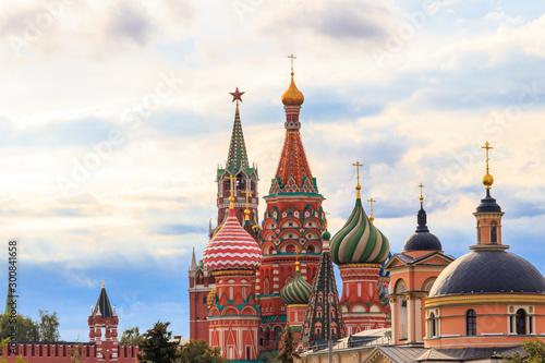 Moscow cityscape. View of St. Basil's Cathedral, Spasskaya tower of Kremlin and Church of St. Barbara on Varvarka street in centre of Moscow, Russia