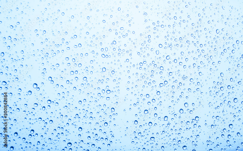 Water drops on glass or rain drop Water drops on glass or rain drop