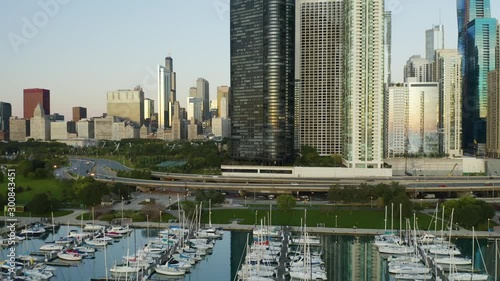 Slow pushback to reveal downtown Chicago harbor and skyline during summer photo