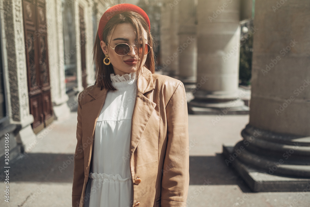 Fototapeta premium Portrait of Young Fashionable Business Woman on the Street