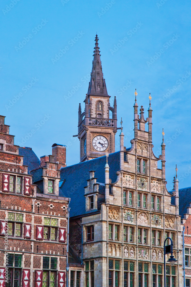 Clocktower and historic buildings in the old town of Gent, Belgium Clocktower and historic buildings in the old town of Gent, Belgium