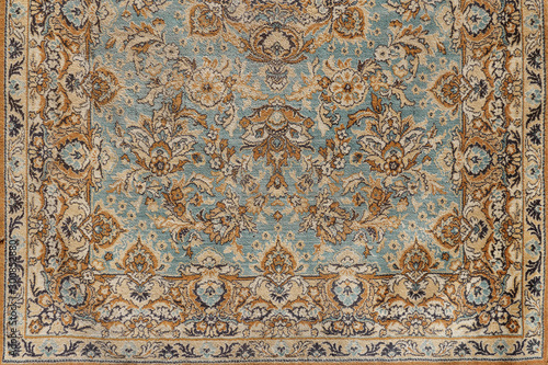 background of antique old oriental carpet, close up