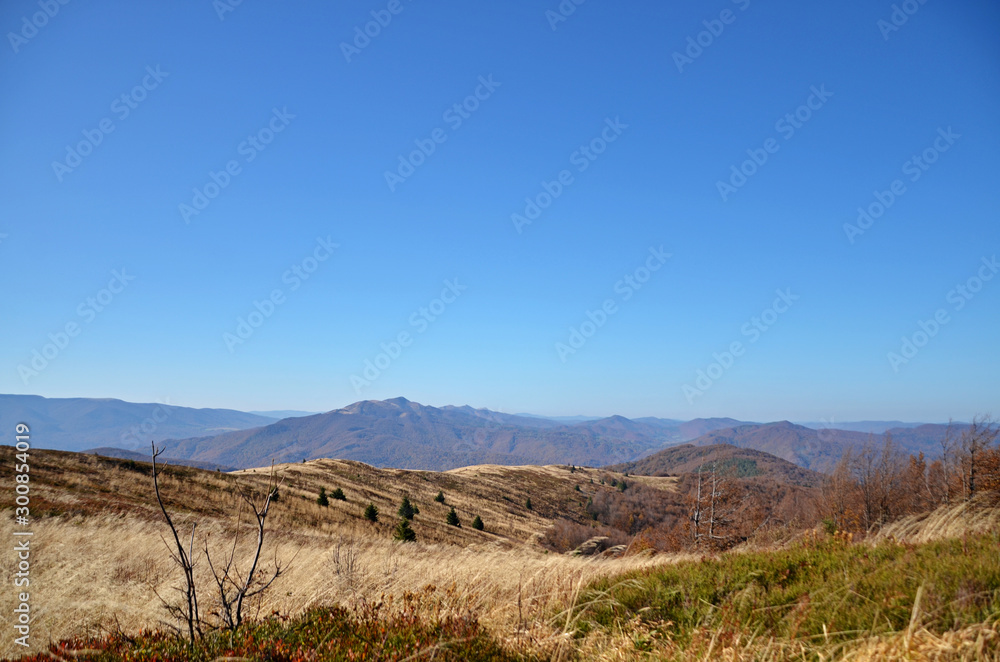 Fototapeta premium View of the peaks of low mountains in the fall