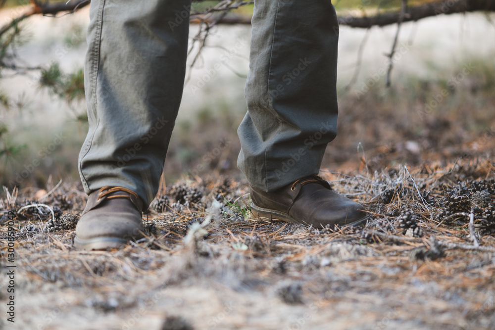 Feet of tourist man casual boots look Feet of tourist man casual boots look