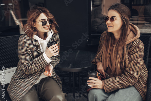 Portrait of Two Fashion Girls, Best Friends Outdoors, Coffee Break Lunch