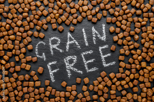 grain free dog food on black background