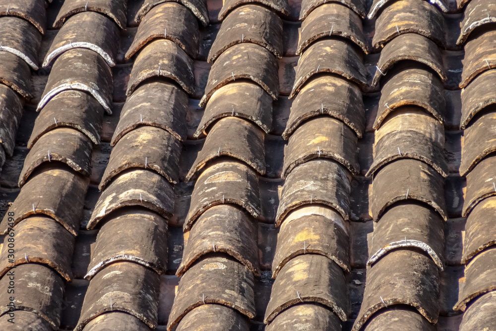 Detail of ancient tiles from the colonial houses of the historic city of Tiradentes, Minas Gerais, Brazil,