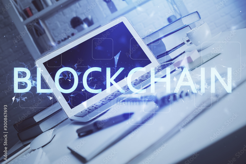 Fototapeta premium Multi exposure of blockchain theme hologram and table with computer background. Concept of bitcoin crypto currency.