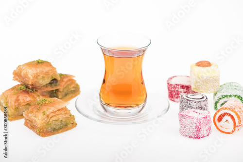 cup of tea near baklava  turkish delight isolated on white