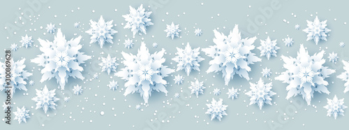 Realistic paper cut snowflakes banner
