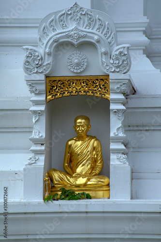 Statue in wall niche, Wat Chedi Luang, Chiang Mai, Thailand