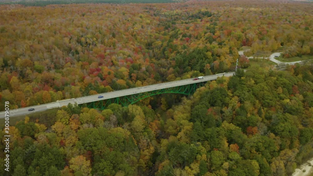 Aerial push in towards green bridge in Michigan's Upper Peninsula Aerial push in towards green bridge in Michigan's Upper Peninsula