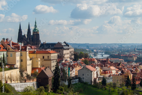 Sunny morning view to Prague city, Saint Vitus cathedral and Vltava river