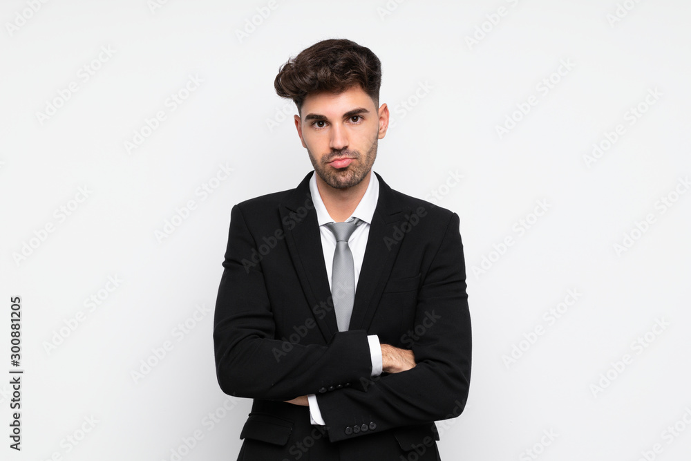 Young businessman over isolated white background sad Young businessman over isolated white background sad