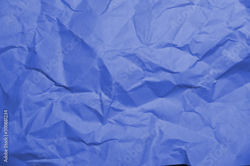 Blue crumpled paper texture background.