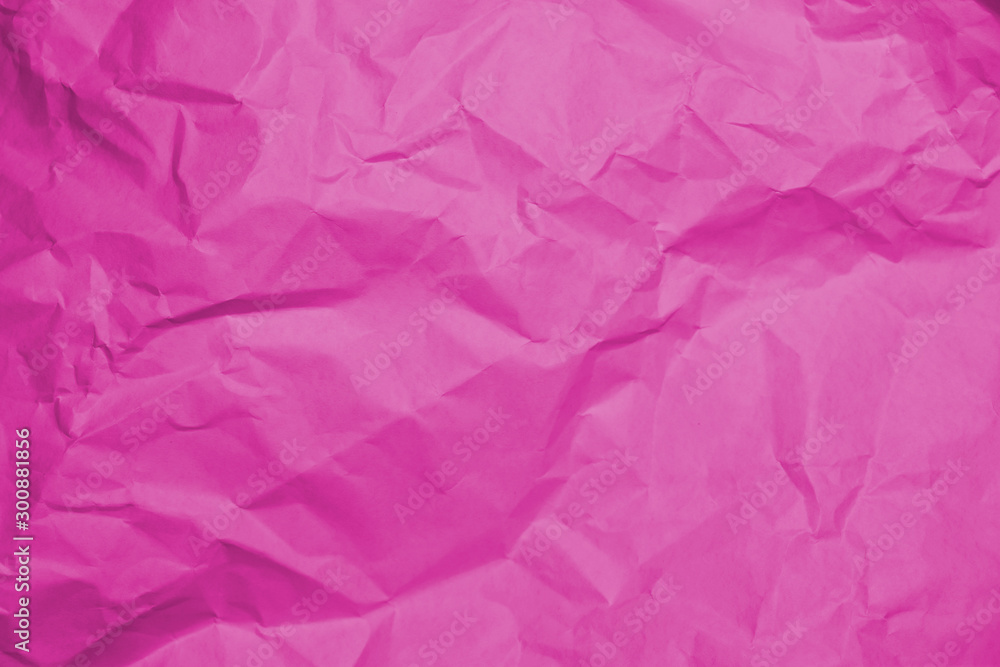 Crumpled recycle pink paper background - Pink paper crumpled texture - Pink paper wrinkled background.