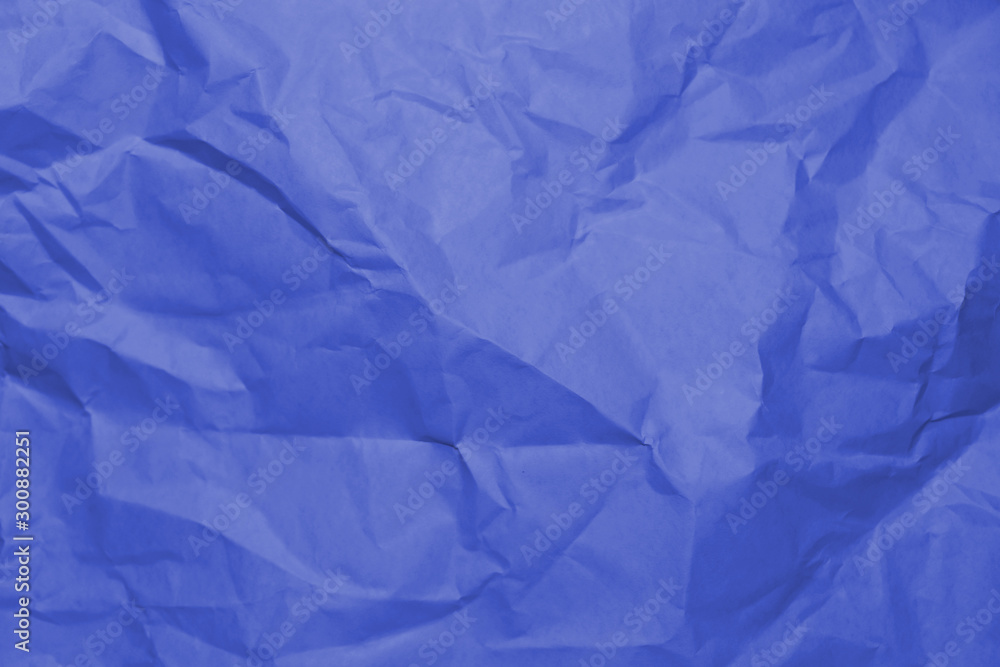 Obraz premium Blue crumpled paper texture background.