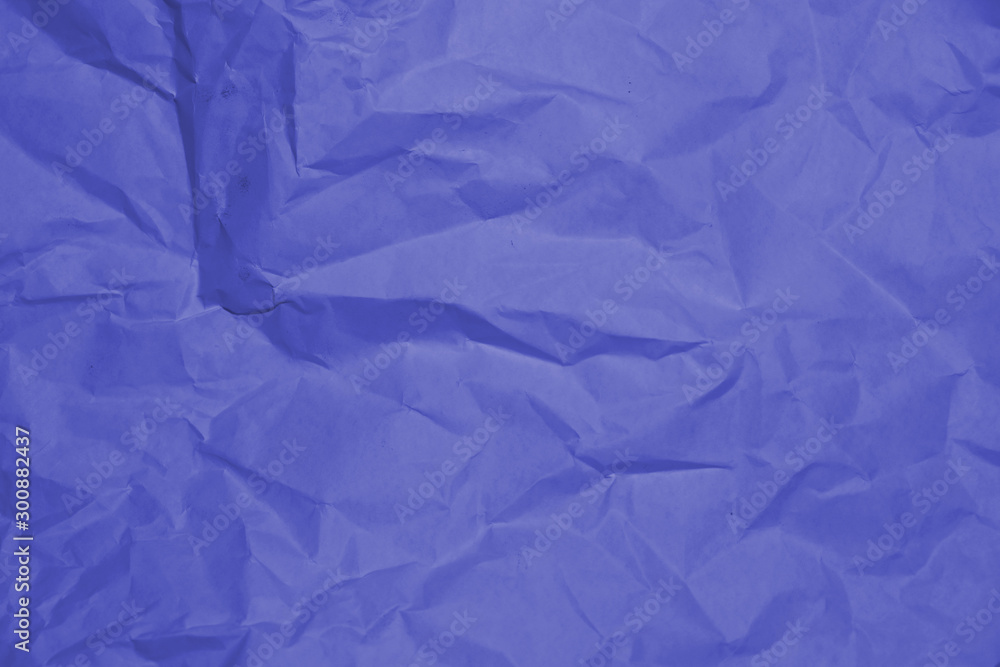 Obraz premium Blue crumpled paper texture background.