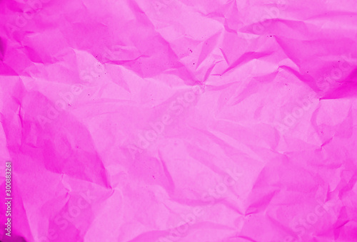 Crumpled recycle pink paper background - Pink paper crumpled texture - Pink paper wrinkled background.