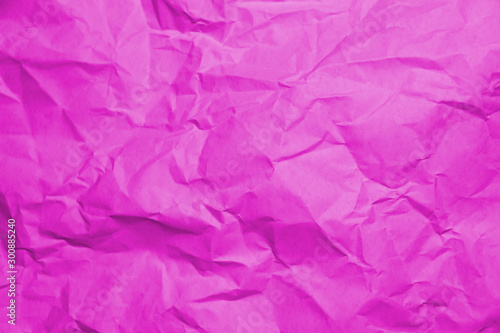 Crumpled recycle pink paper background - Pink paper crumpled texture - Pink paper wrinkled background.
