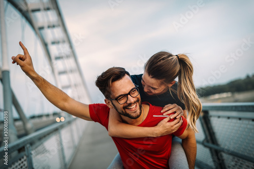 Fit happy couple having fun outdoor during exercise