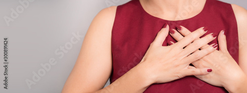 Wallpaper Mural Banner of faithful woman's hands on chest near heart showing thankful or kindness. Concept of Health care, Charity, Organ Donation, Grateful, Relief, Peaceful, Hopeful, Love, honest, Appreciation. Torontodigital.ca