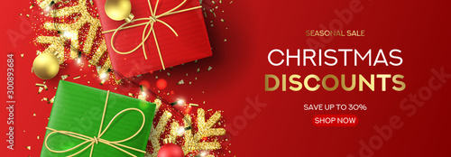 Web banner for Christmas sale. Holiday background with red and green gift boxes, light garlands, Christmas golden balls, confetti and snowflakes. Vector illustration. Seasonal discount.