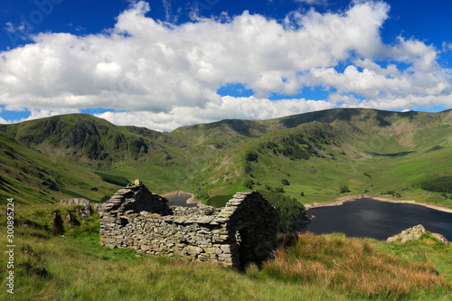 Ruined Bothy above Haweswater reservoir, Mardale valley, Lake District National Park, Cumbria, England, UK photo