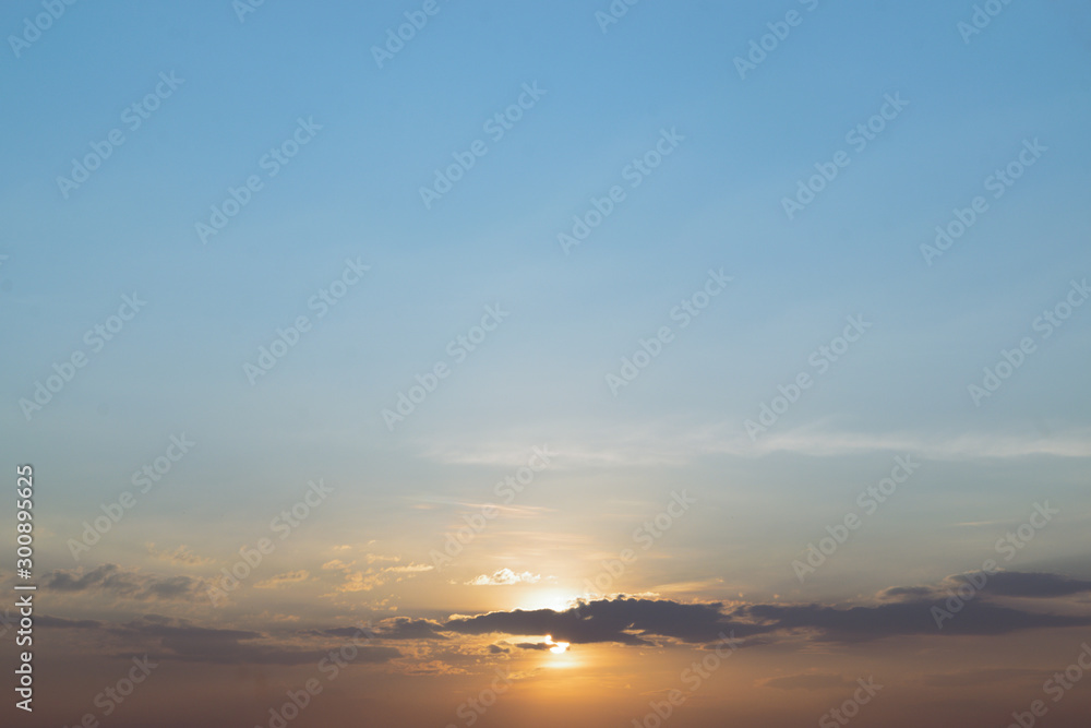 Blue sky sunset with soft white cloudy atmosphere is clear and clean.