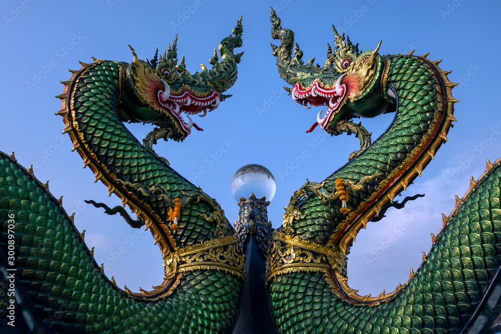 Beautiful dragon on the rooftop of Thailand landmark. Beautiful dragon on the rooftop of Thailand landmark.
