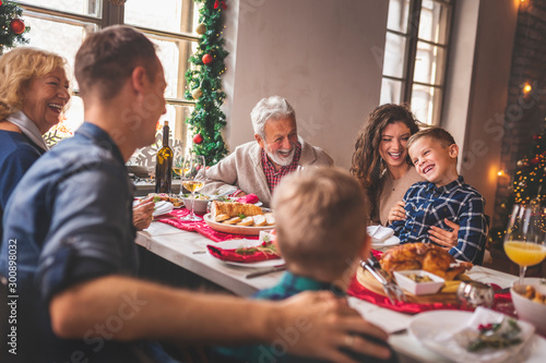 Family gathered for Christmas dinner photo