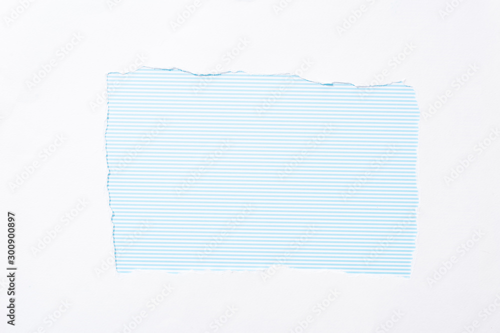 blue and white striped background in white torn paper hole blue and white striped background in white torn paper hole