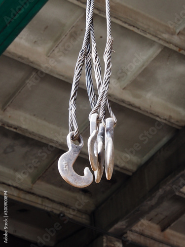 Snap bridge crane, slings with hooks to lift multi-ton cargo.