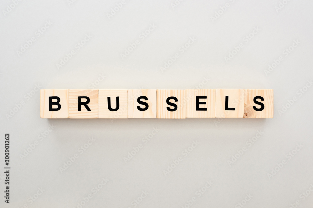 top view of wooden blocks with Brussels lettering on grey background top view of wooden blocks with Brussels lettering on grey background