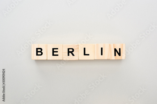 top view of wooden blocks with Berlin lettering on grey background
