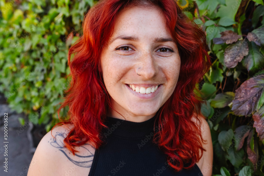 Portrait of a beautiful red-haired young girl with freckles. Portrait of a beautiful red-haired young girl with freckles.