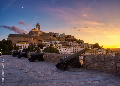 beautiful sunset in the historic area of Dalt Vila in Ibiza,Balearics,Spain.Cathedral and white houses in the wall area