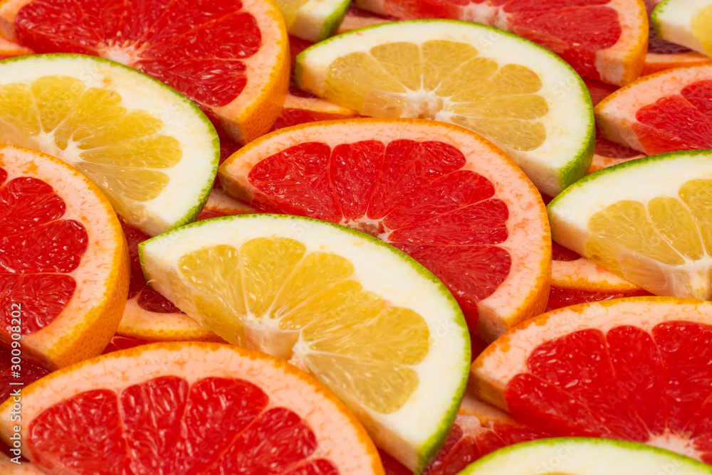 Pomelo and grapefruit slices background. Pomelo and grapefruit slices background.