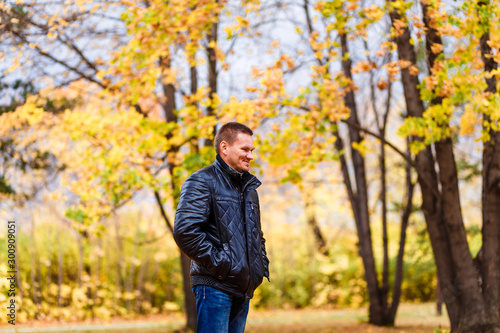 man in a leather jacket in autumn